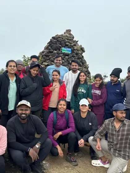 A fun group photo at the Kumaraparvatha peak, showing the diverse mix of people who join my treks.