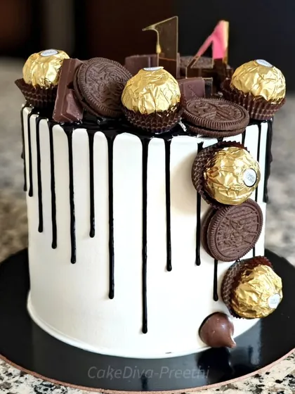 A tall, double-barrel cake loaded with everyone's favorites. This chocolate drip cake is topped with Ferrero Rocher, Oreo cookies, and chocolate bars, making it a truly decadent treat for any celebration.