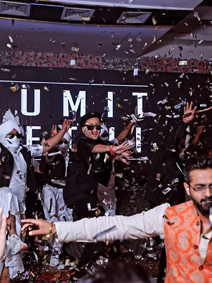 A party isn't a party without some explosive fun. I make sure to capture the peak moments, like this confetti shower, that show the sheer energy and celebration of the event. These are the shots that make you feel the excitement all over again.