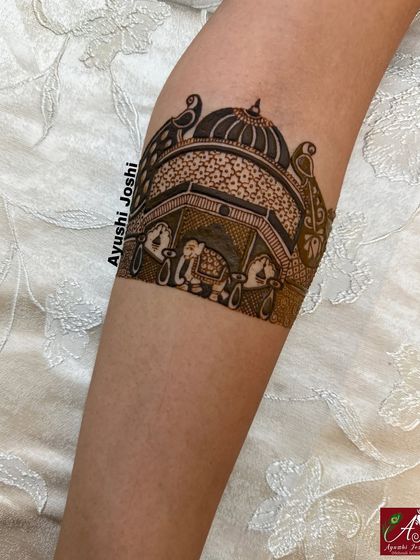 The upper portion of the design is now complete, with the elephants and palace fully detailed. Notice the contrast between the filled and empty spaces.