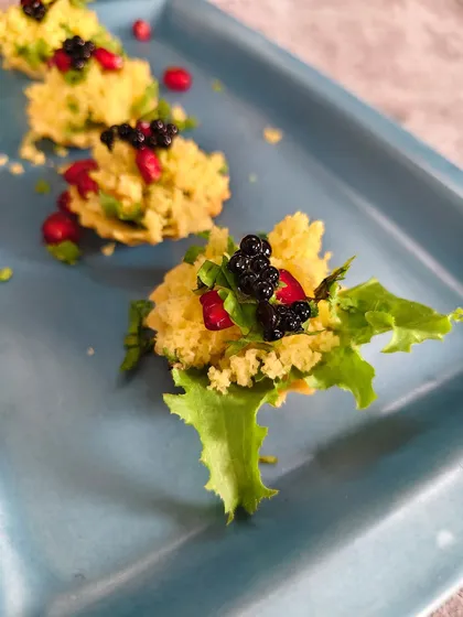 When tradition puts on its party outfit, you get our Sev Khamini Mini Tart. A delightful Gujarati snack transformed into an elegant, bite-sized appetizer.