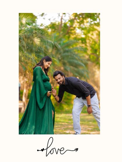 A playful moment captured outdoors as the father-to-be leans in towards the baby bump with a fun expression. The image is full of joy and personality.