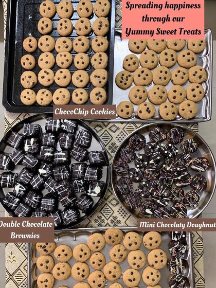 Spreading happiness through my yummy sweet treats. Here are trays of freshly baked ChocoChip Cookies, Double Chocolate Brownies, and Mini Chocolaty Doughnuts.