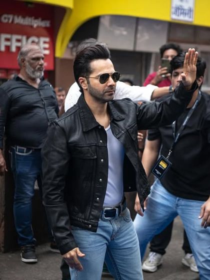 Capturing the chaos and excitement of a star's arrival. This candid shot from the Amazon Prime event gives a real 'on the ground' feel.