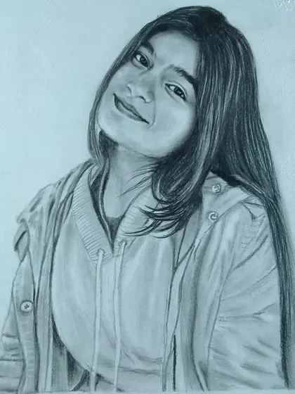 A casual portrait of a young woman in a hoodie. I can create a realistic sketch from any of your favorite photos.