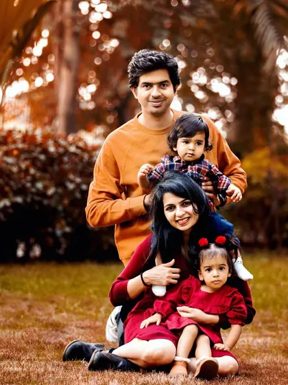 A family portrait with one year old twins is full of life and wiggles! I love this fun pose that gets everyone close together for a happy family photo. It perfectly captures the playful spirit of this family of four.