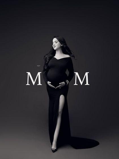 A beautiful and serene black and white portrait with the word "MOM" elegantly placed. It's a simple and powerful tribute to motherhood.