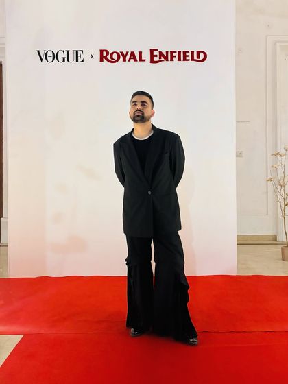Attending the Vogue India x Royal Enfield collaboration event. For this, I wore an oversized black blazer with wide-leg cargo pants for a look that is both formal and fashion-forward.