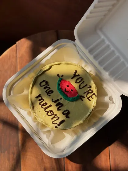 A punny and cute "You're one in a melon!" bento cake. These playful designs are perfect for anniversaries, Valentine's, or just to make someone smile.
