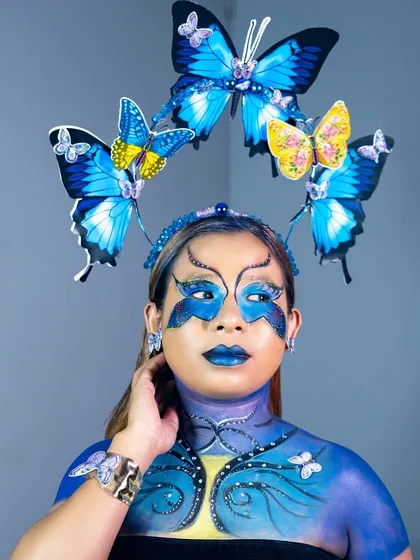 Let your creativity run wild in my fantasy makeup module. This stunning butterfly-inspired look, complete with intricate body art and a custom headpiece, shows the level of artistry my students achieve.