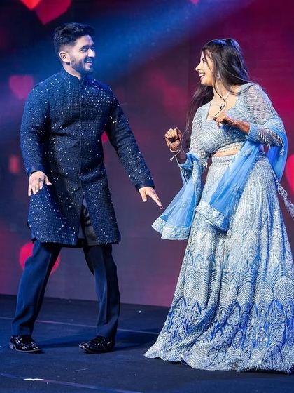 When dance is your love language, it shows. This couple's sangeet performance was filled with joy and perfectly synchronized moves against a backdrop of hearts.