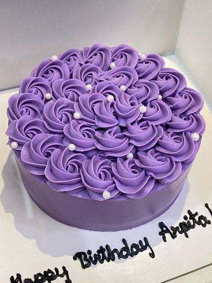 Another look at this gorgeous lavender rosette cake. The texture and color are just perfect.