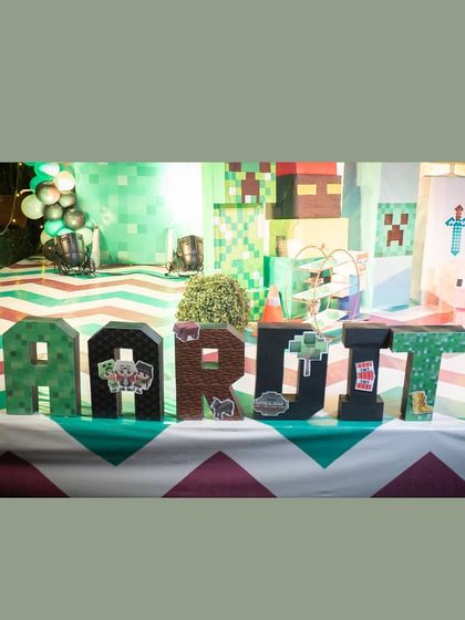 Detailing is everything. I loved customizing these Minecraft-themed name blocks for Aardit. His excitement for the decor, and especially the cake, was the best reward.