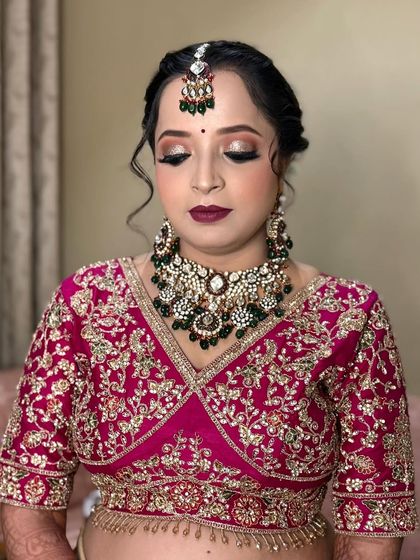 A close-up of the makeup look for my bride Rinki. I created a shimmery eye with a deep berry lip to match her beautiful lehenga.