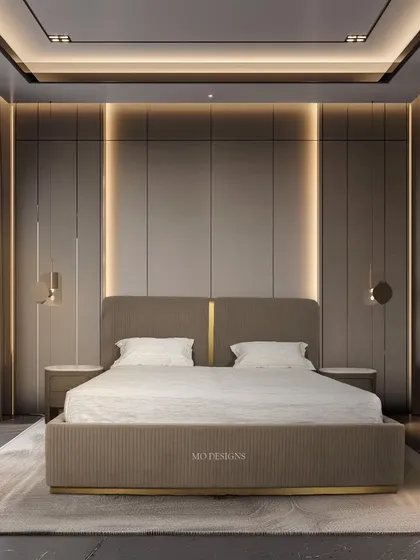 A bedroom should be your personal retreat. Our Greco bed, with its meticulously upholstered headboard and brushed gold accents, creates a focal point of modern luxury. We designed this space to feel serene and sophisticated, a perfect blend of comfort and high design.