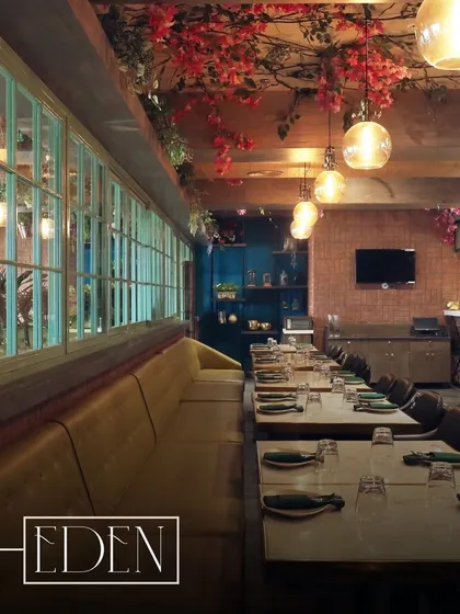 I handled the general contracting for Eden Botanic Kitchen, a restaurant designed to feel like an indoor garden. This dining area features lush floral arrangements on the ceiling, custom seating, and warm, ambient lighting to create an immersive and enchanting experience for guests.
