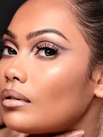 A close-up of a graphic eyeliner look, demonstrating precision and control.