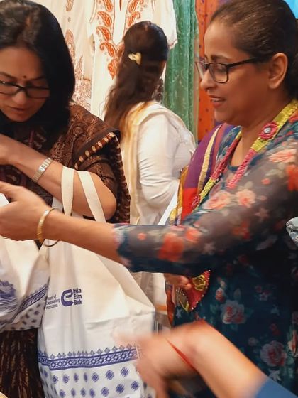Interacting with customers at the Exim Bazaar. Every purchase supports our artisans and helps us take our mission forward.