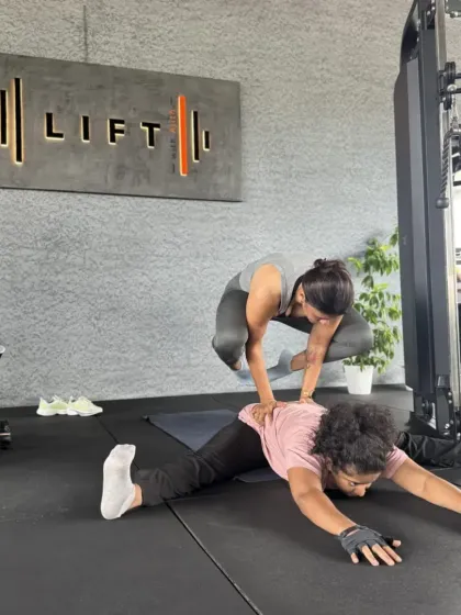 Here's the moment I was getting ready to launch into a crow pose on my friend's back. We have a penchant for the bizarre and love to challenge ourselves with creative partner poses.