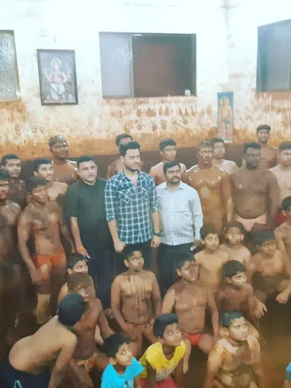 This is the real wealth of our akhada. Wrestlers of all ages, from young children to senior pailwans, united by the 'lal mati' and a shared commitment to hard work and respect. This is our family.