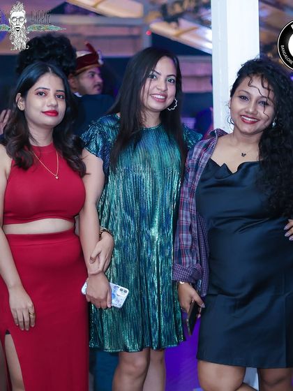 A stylish group of ladies enjoying a Saturday night rooftop party at Hungry Hippie.