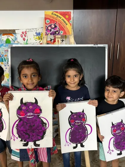 Our little artists making their beloved 'Hansmukh Rakshas' character from a Tulika Books story. Our art classes are not just about technique but about enjoying the entire creative process.