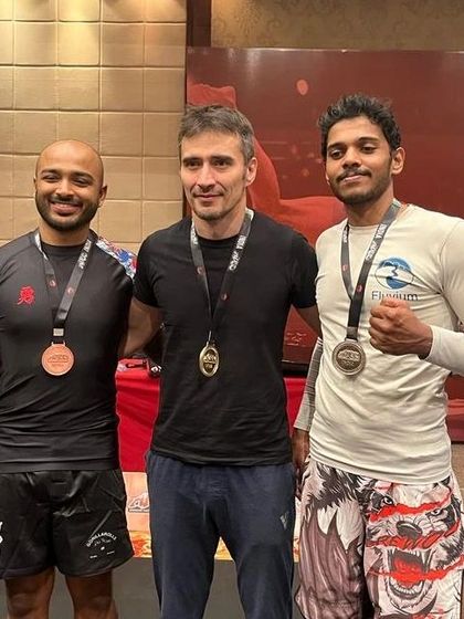 With friends and fellow medalists at the ADCC India 2023 event. The grappling community is full of tough, respectful athletes.