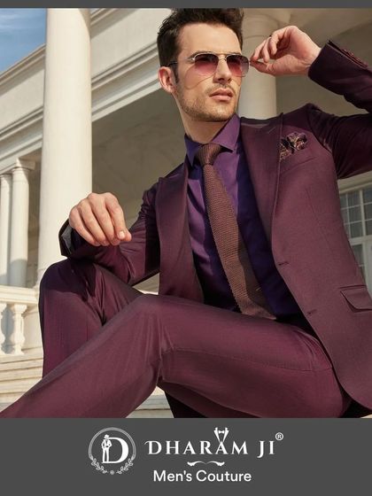 A full suit in a rich plum color, paired with a matching shirt and a contrasting tie. This monochromatic look is incredibly chic and modern.
