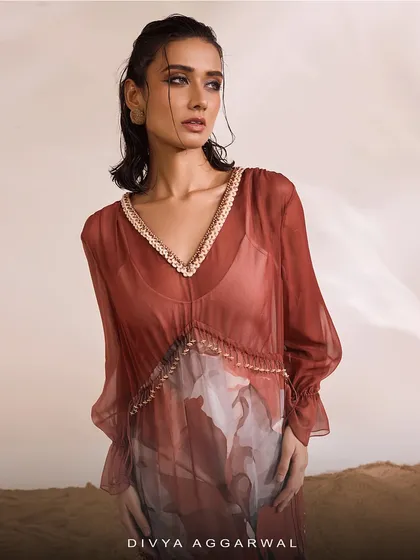 A portrait in the Aurelia Kaftan Set, where jeweled highlights illuminate its breezy contours.