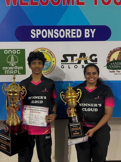 Abhinav Murthy and Kushi V showcasing their trophies from the 3rd Karnataka state ranking tournament in Mangalore. Abhinav won the U19 Boys singles for the third time in a row, and Kushi was the Women's singles runner-up.