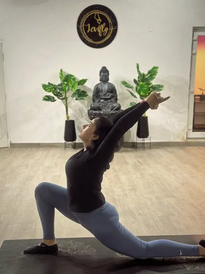 Celebrating a student's beautiful progress in Anjaneyasana, the low lunge pose. This is a testament to her consistency and dedication, showing how a regular practice can create grace and openness in the body.