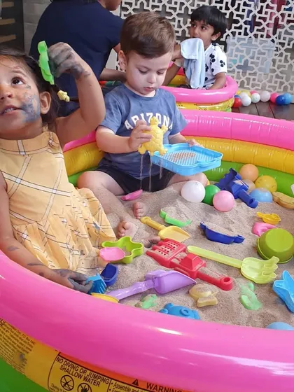 Our indoor sandpit is always a huge hit! It's a fantastic sensory activity where toddlers can dig, pour, and build, developing fine motor skills while having a blast.