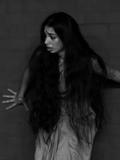 Another take on the physical expression of fear, using the wall as a prop to convey a sense of being trapped.