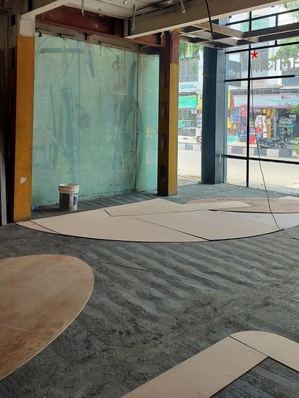 The execution of our custom flooring design required precision. We created full-scale plywood stencils on-site to test the accuracy of our CAD drawings before the tiles were cut and laid with brass inlays, ensuring a flawless finish.