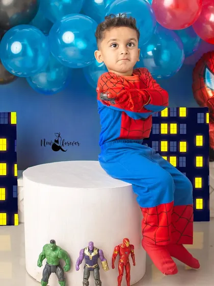 A tough superhero pose with arms crossed. He's ready to take on any villain that comes his way in this fun and powerful portrait.
