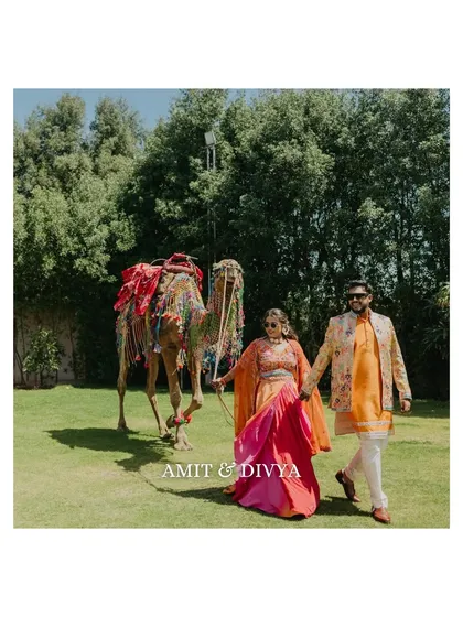 A touch of Rajasthani royalty at this Haldi carnival. The couple walking with a decorated camel adds a unique and traditional element to their celebration, which we were excited to capture.