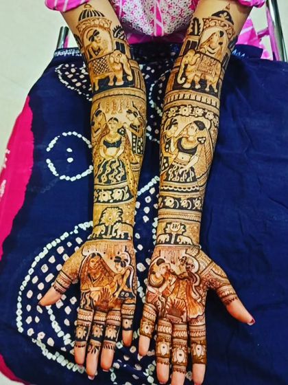 A narrative design showing different stages of a relationship. The arms feature scenes of the couple's journey, with elephants and traditional patterns.