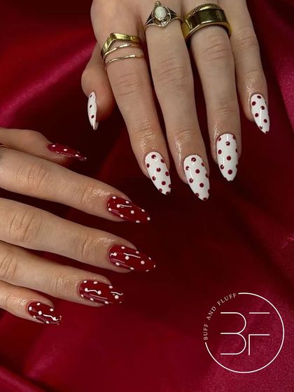 A bold and classic combination of red and white polka dots. This design is perfect for making a statement and adding a touch of retro charm to your look.