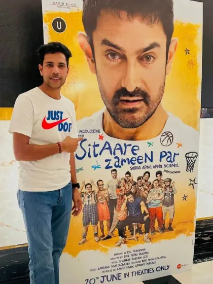 Standing next to the official movie poster for 'Sitaare Zameen Par'. This project was more than a film; it was a celebration of how far passion for sports can take you.