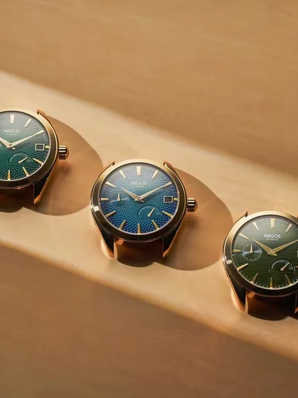 A lineup of the Argos collection, showcasing the different colorways. This kind of shot is essential for catalogs and websites, and the key is consistent lighting that accurately represents each dial color while creating a pleasing, rhythmic composition.