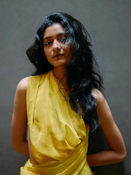 A beautiful portrait from the yellow drape test shoot. The soft, natural styling of the hair and the simple drape create a timeless and authentic feel.