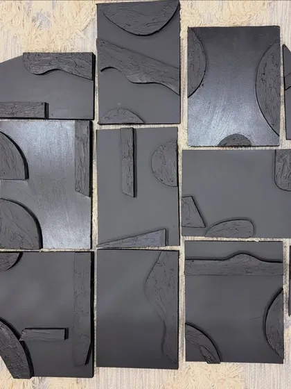 This is a multi-panel sculptural piece made from acrylic on board. Each of the 13 panels is uniquely shaped and textured, designed to be arranged into a larger, cohesive abstract composition.