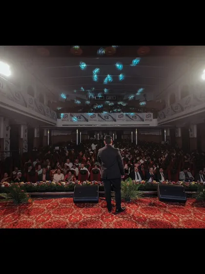 Addressing a packed town hall is where I feel most at home. My job is to connect with every single person in the room, ensuring the company's message is delivered with energy and impact.