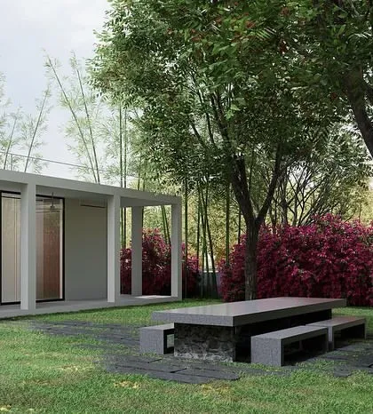 This small weekend retreat was designed to be a private, quiet, and reclusive space. The minimalist, neutral architecture intentionally steps back, allowing the lush surrounding landscape with its dense bamboo and flowering shrubs to become the main focus and create a sense of total immersion in nature.