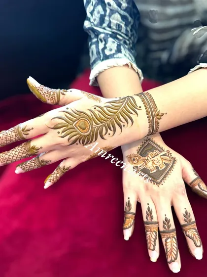 A modern and minimalist take on nature motifs. This design features a single large peacock feather on one hand and Krishna's flute on the other.
