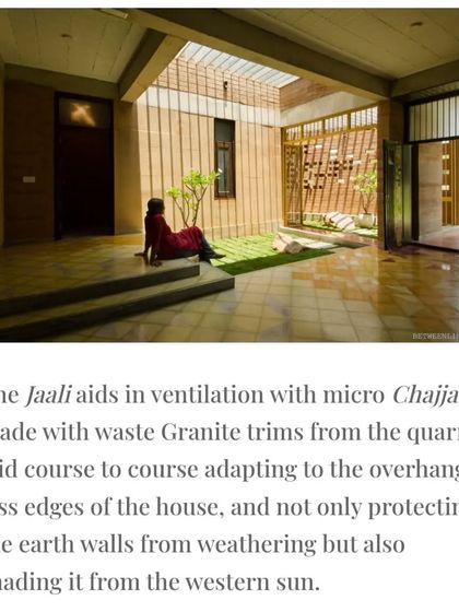 The 'jaali' screen, made from waste granite trims, aids in ventilation and shades the earth walls from the western sun. This feature is a functional element that also adds a delicate, patterned texture to the facade.