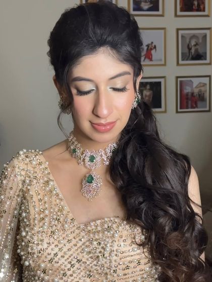 A close-up on this baby shower glam. The eyes have a soft, silvery shimmer, and the skin is dewy and radiant, creating a look that is both celebratory and sophisticated.