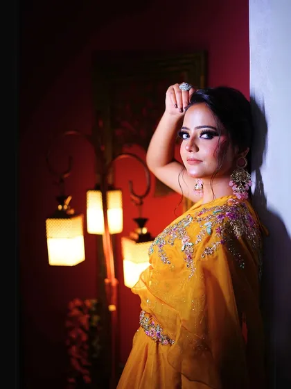 Another beautiful portrait that highlights the intricate embroidery on the blouse.