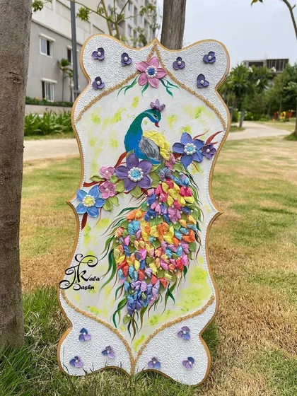 My peacock sculptures are a bestseller, and this piece shows why. Each feather in the tail is individually sculpted and painted with a rainbow of colors, creating a stunning display of texture and vibrancy that brings joy and prosperity into the home.