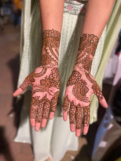 An Indo-Arabic design with a mix of peacock and floral motifs. The patterns are intricate and flow beautifully.
